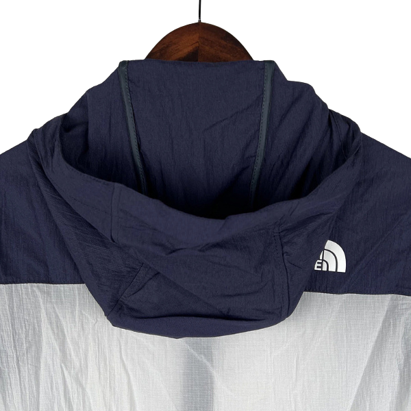 The North Face Blue and White Windbreaker Jacket