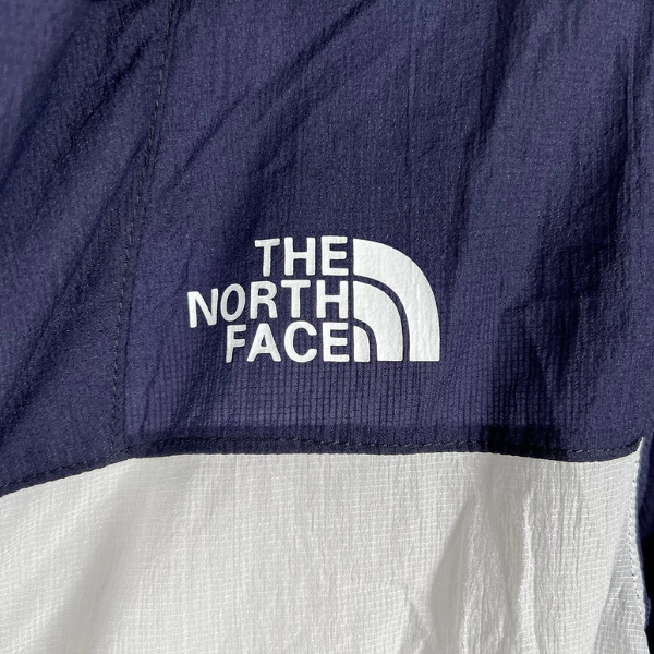 The North Face Blue and White Windbreaker Jacket